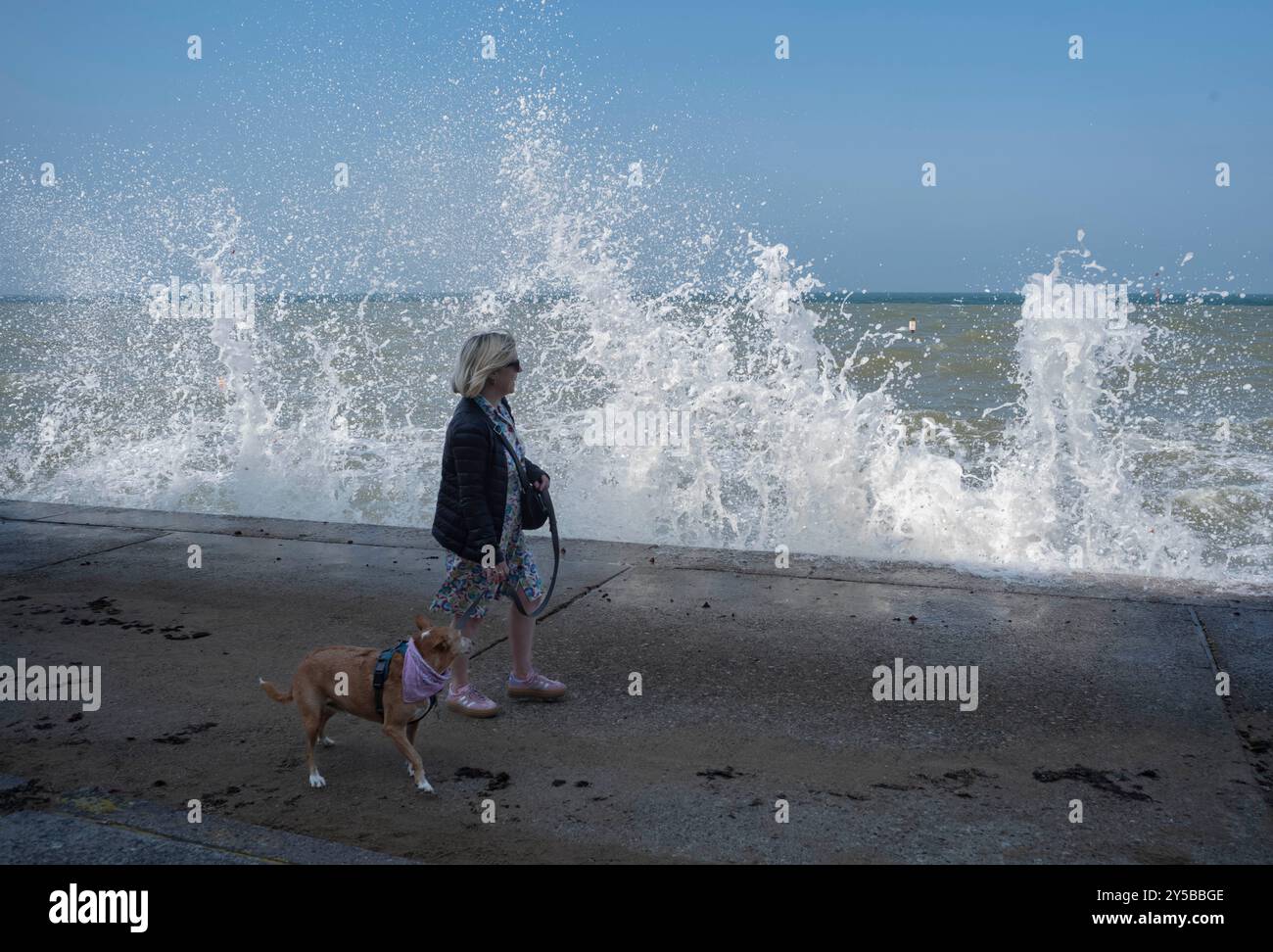 Waves crash against a sea wall in Margate, Kent as the Met Office extends a weather warning with thunderstorms storm and heavy rain expected across th Stock Photo