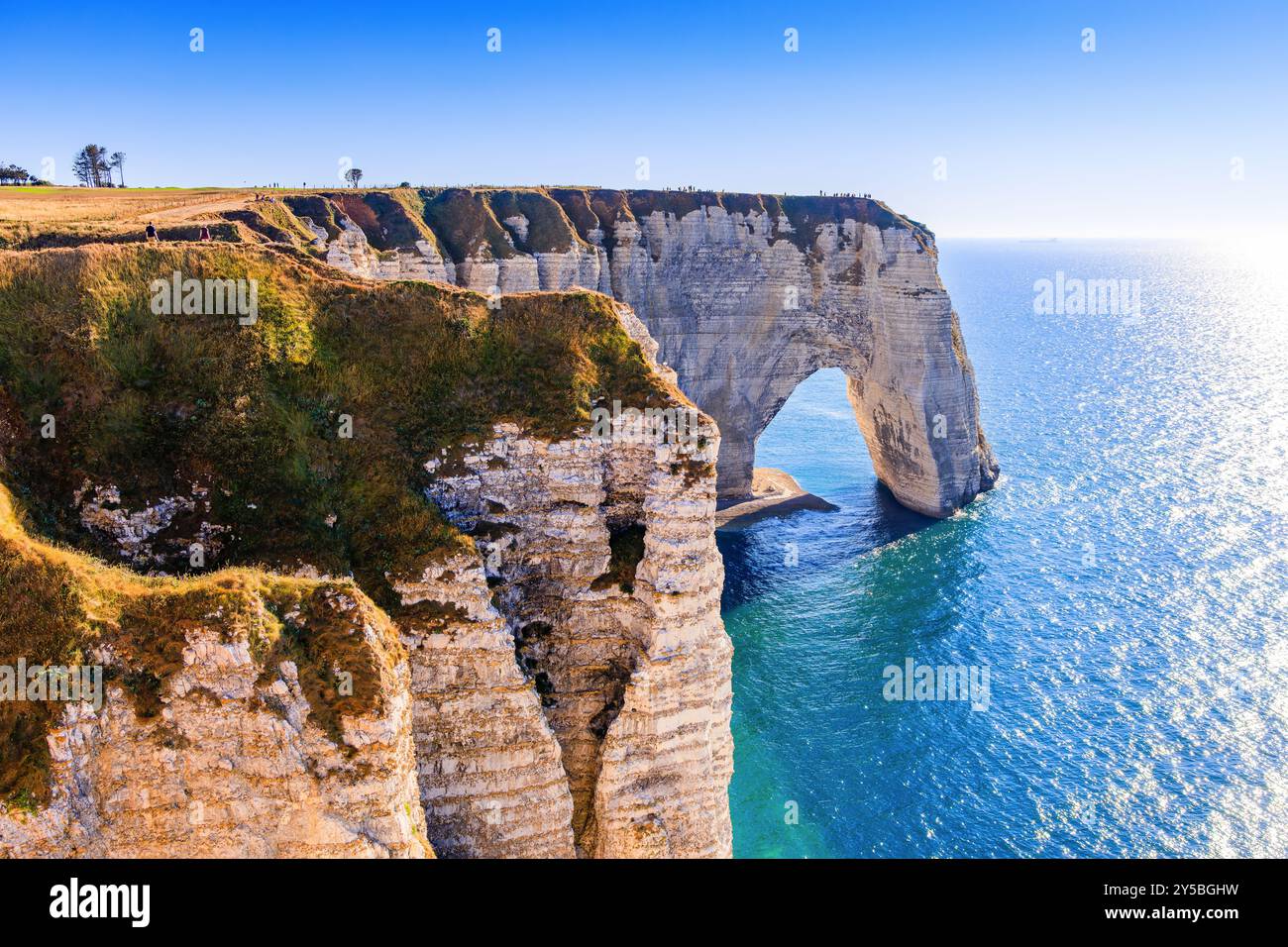 Normandy, France. Etretat village cliffs with the Manneporte arch and the Valaine beach. Stock Photo