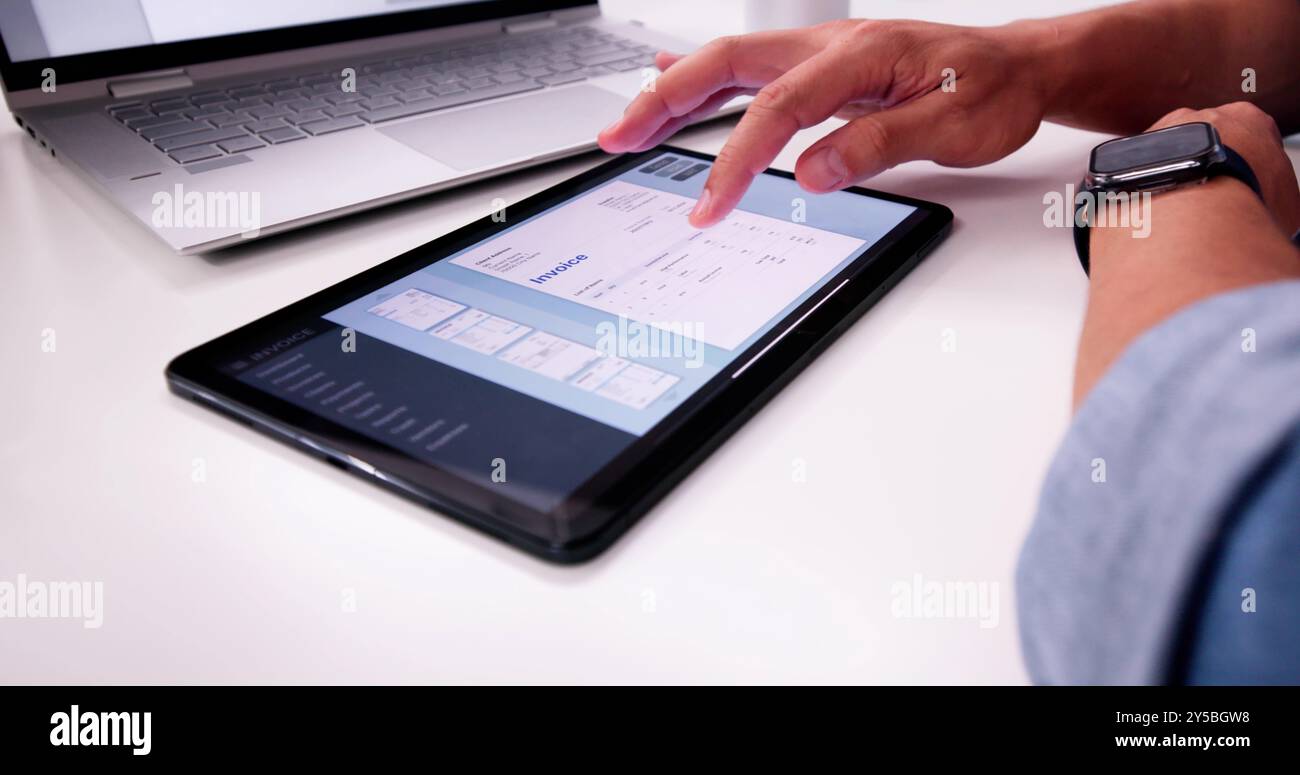 Online Digital E Invoice Statement On Laptop Stock Photo