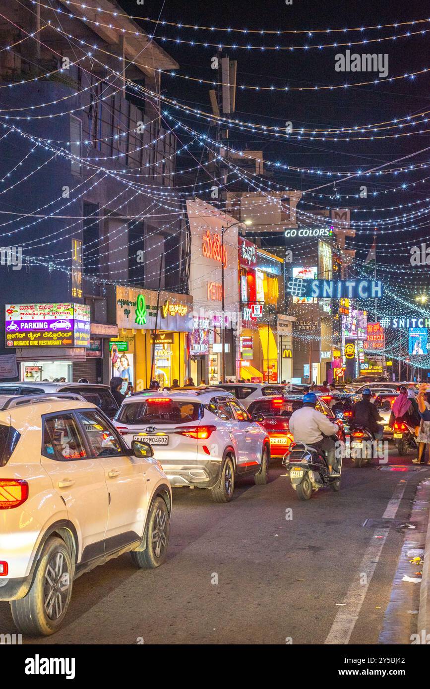 Brigade Road Bengaluru Karnataka India September 7 2024 Busy lit up streets and shops and buildings at Brigade Church Street and MG road in Bengaluru Stock Photo