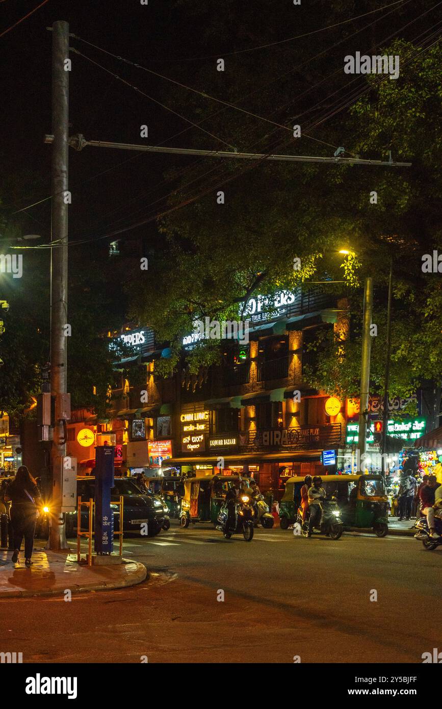 Brigade Road Bengaluru Karnataka India September 7 2024 Busy lit up streets and shops and buildings at Brigade Church Street and MG road in Bengaluru Stock Photo