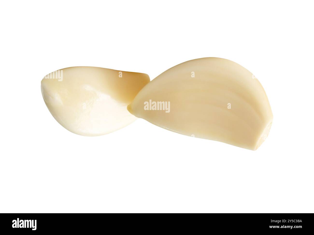 Top view of white peeled garlic clove in stack is isolated on white ...