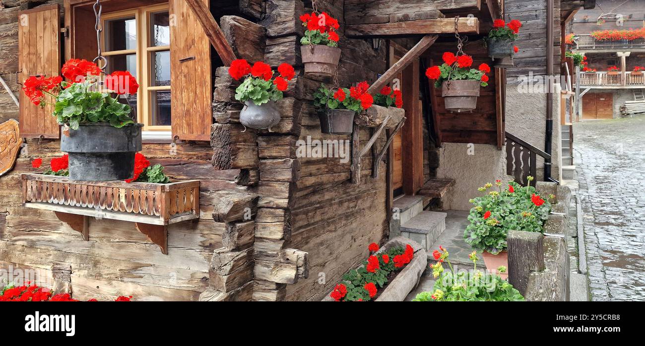 Most beautiful Swiss villages - pretty Griementz with traditional wooden houses and floral streets. popular tourist attraction in Valais Canton of Swi Stock Photo