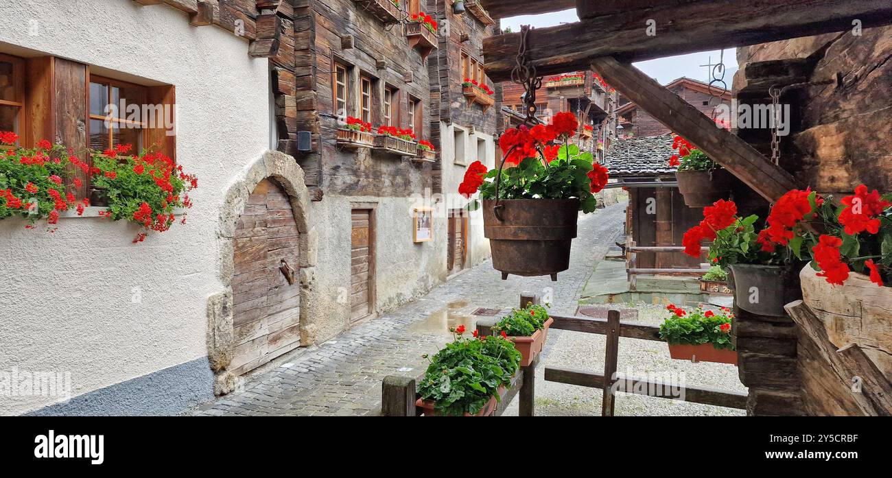 Most beautiful Swiss villages - pretty Griementz with traditional wooden houses and floral streets. popular tourist attraction in Valais Canton of Swi Stock Photo