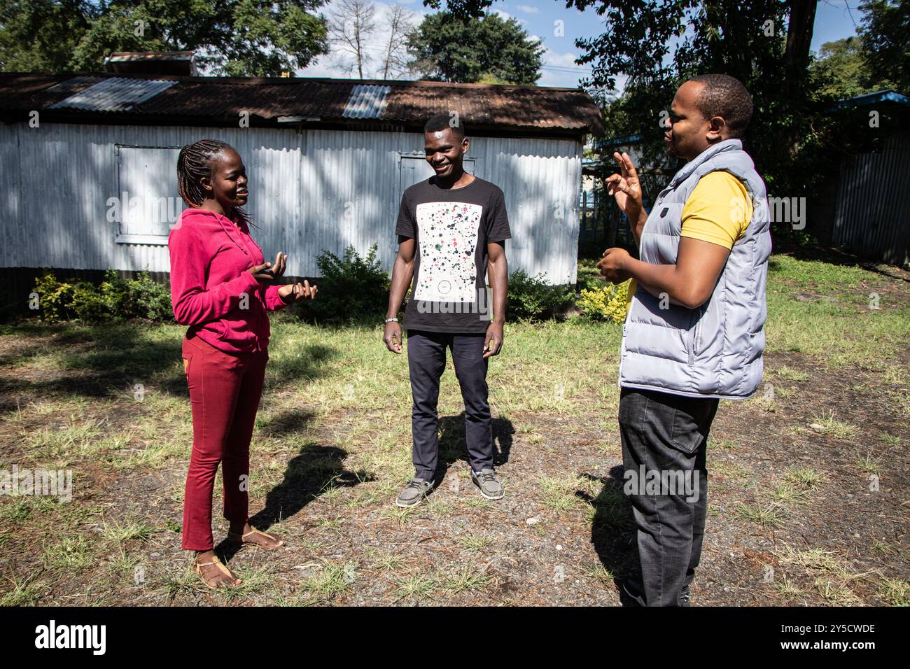 Martin Njoroge, a deaf sign language teacher interacts with his ...