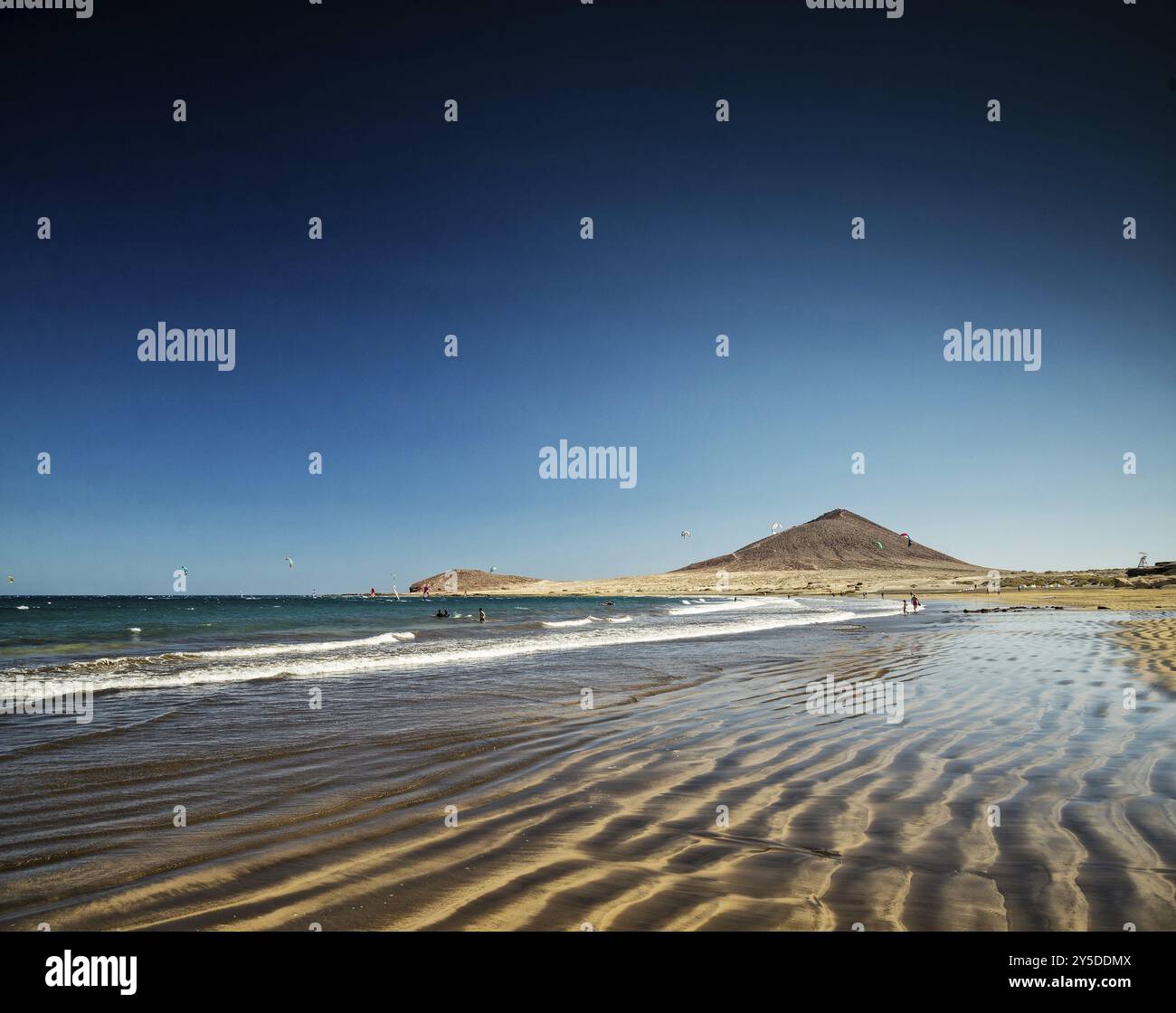 El medano tourist beach and montana roja famous coast landscape in ...