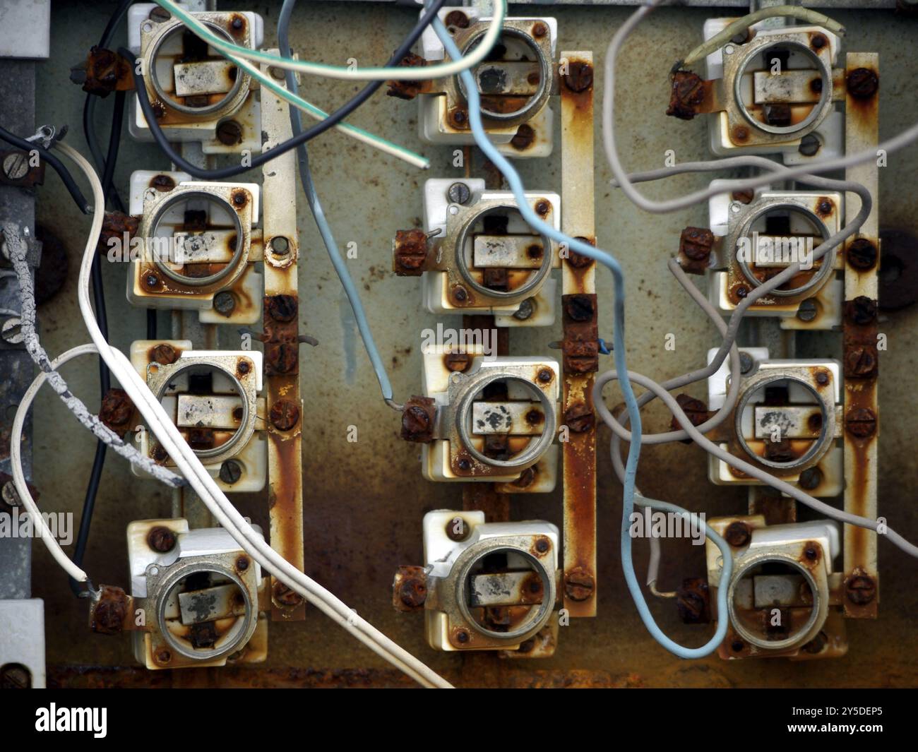 Old fuse box without fitting screws and screw caps Stock Photo