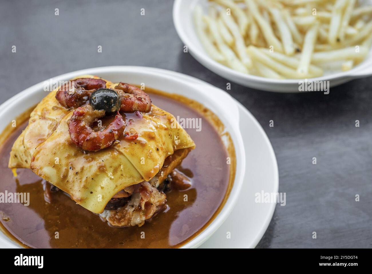 Famous Francesinha Traditional Meat Cheese And Spicy Sauce Grilled famous-francesinha-traditional-meat-cheese-and-spicy-sauce-grilled