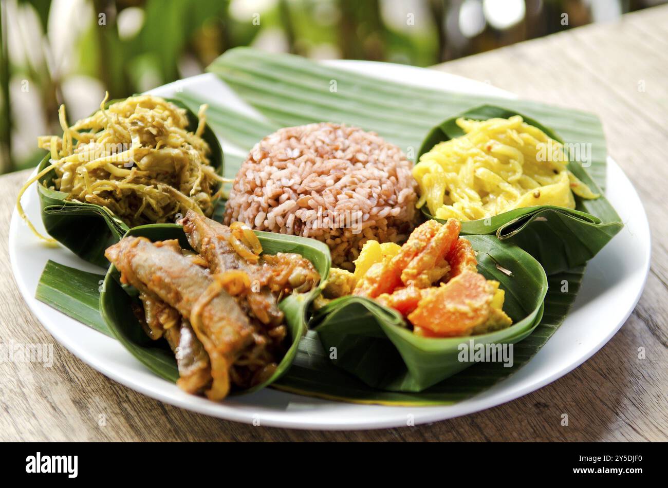 Indonesian food in bali, several curries and rice Stock Photo - Alamy
