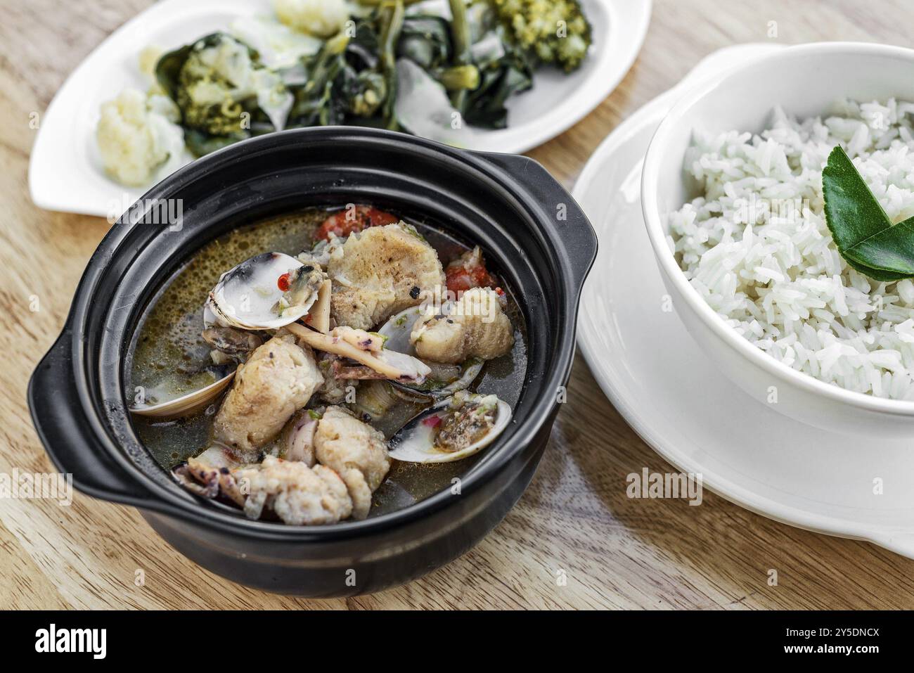 Traditional fish clams and mixed seafood portuguese spicy soup stew meal Stock Photo