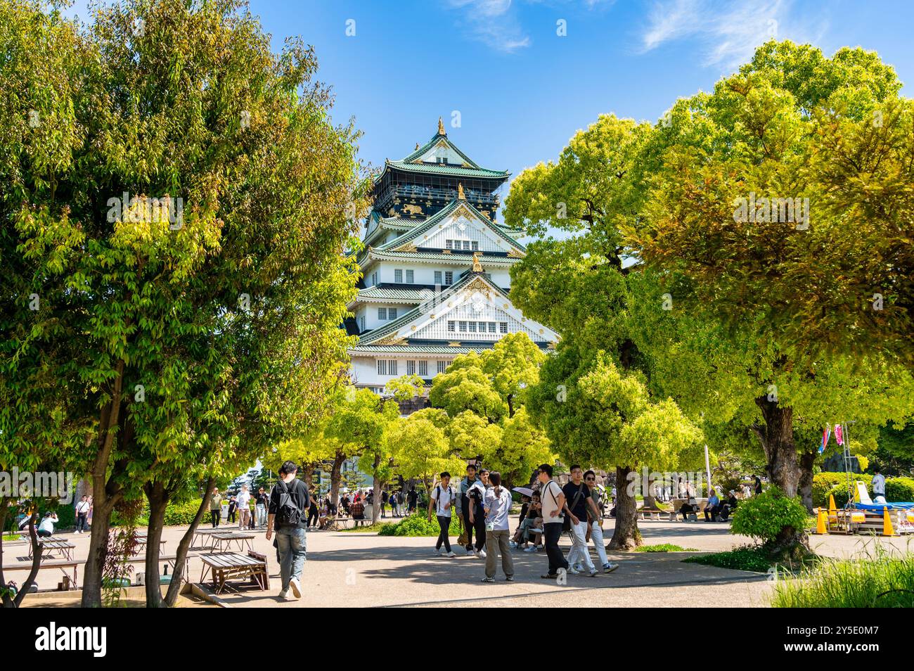 Osaka, Japan - 05.05.2024: Crowd of tourists visiting Osaka Castle, the most famous landmark and ...