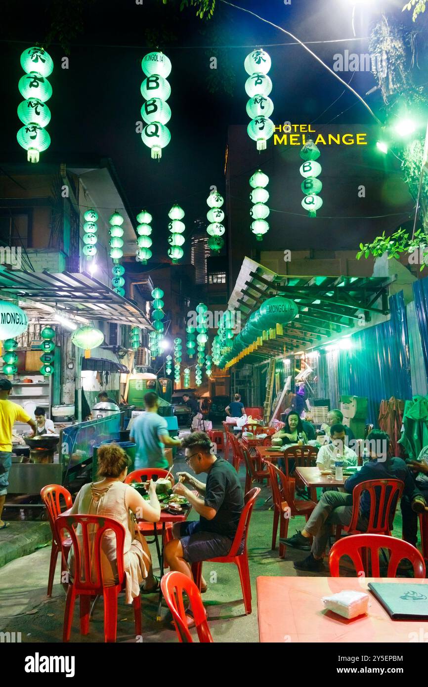 mongolia BBQ stall  in changkat bukit bintang selling street food and market at night in Kuala lumpur malaysia Stock Photo