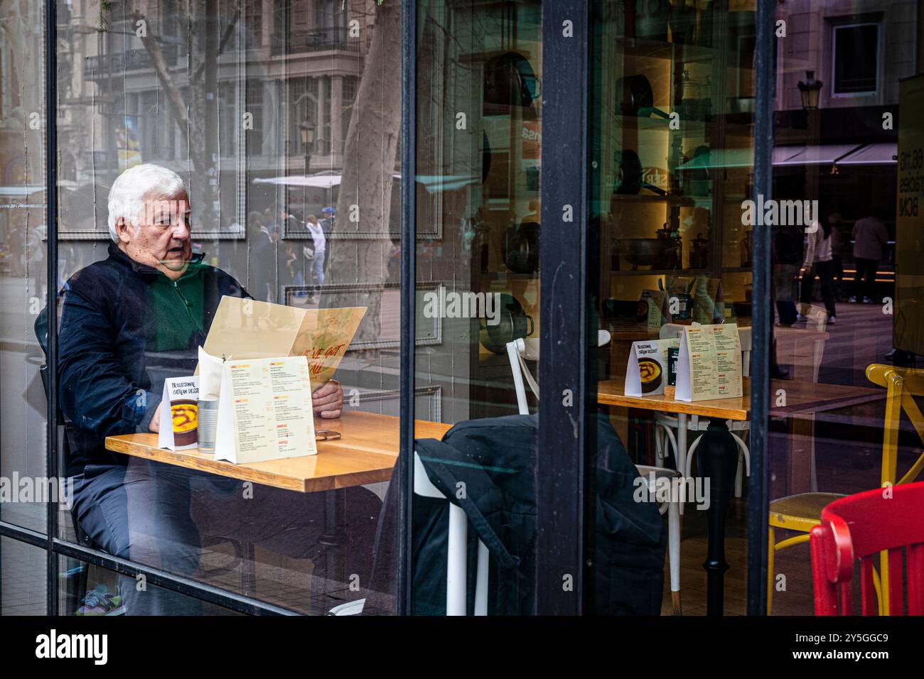 Barcelona, Spain 24 March 2024 Man choosing what to order from a