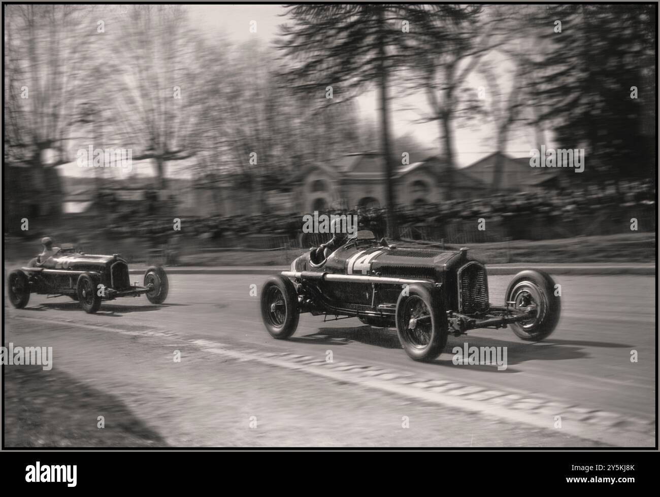 The 1935 Grand Prix de Pau, held on March 24, 1935, was a significant race featuring some of the top drivers of the era, including René Dreyfus and Tazio Nuvolari. René Dreyfus (#20) and Tazio Nuvolari (#14) at the 1935 Grand Prix de Pau Dreyfus and Nuvolari at 1935 Grand Prix de Pau France Stock Photo