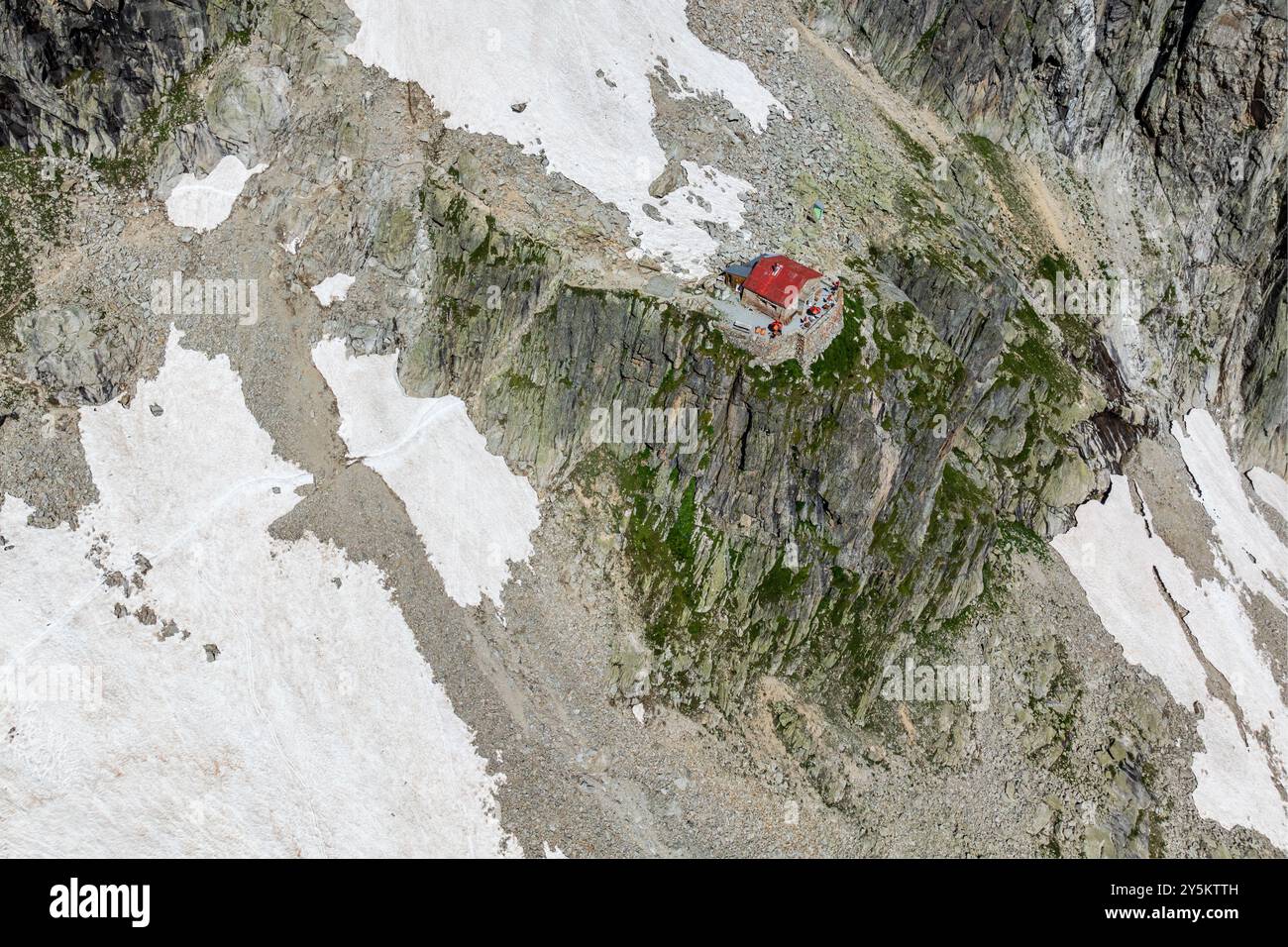 Aerial view of mountain hut Cabane de l'A Neuve, located on a steep rock formation, near La Fouly, Val de Ferret , Valais,  Switzerland Stock Photo