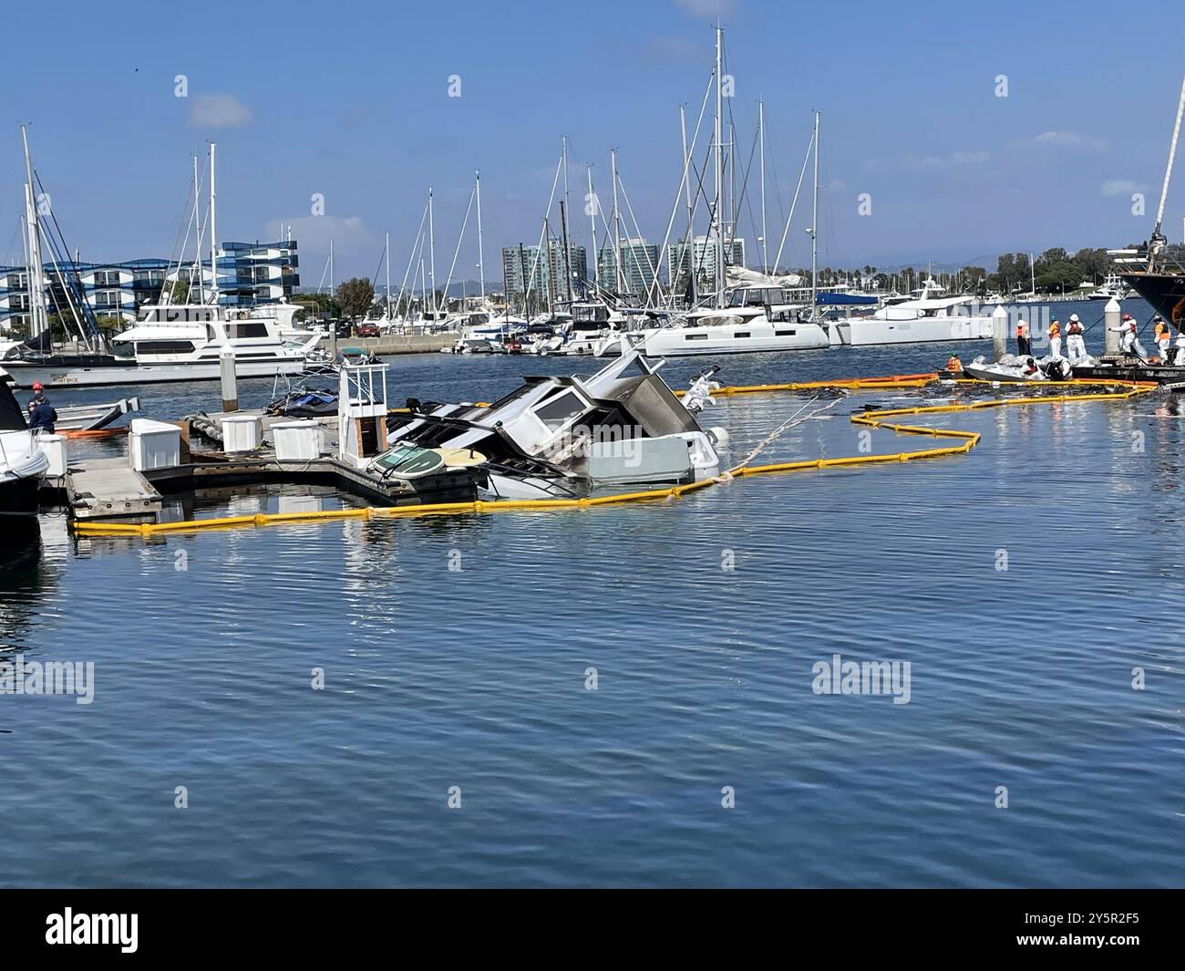 The Unified Command continues to coordinate the recovery of diesel  fuel and reports no active sheening after a 105-foot yacht caught fire in Marina del Rey, California, September 20, 2024. Additionally, air monitoring is being conducted within the area. There are currently no reports of a threat to public health. (Photo by CDFW-OSPR) Stock Photo