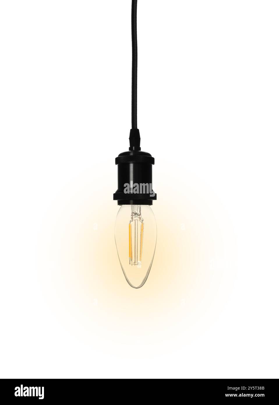 One glowing light bulb hanging on white background Stock Photo - Alamy