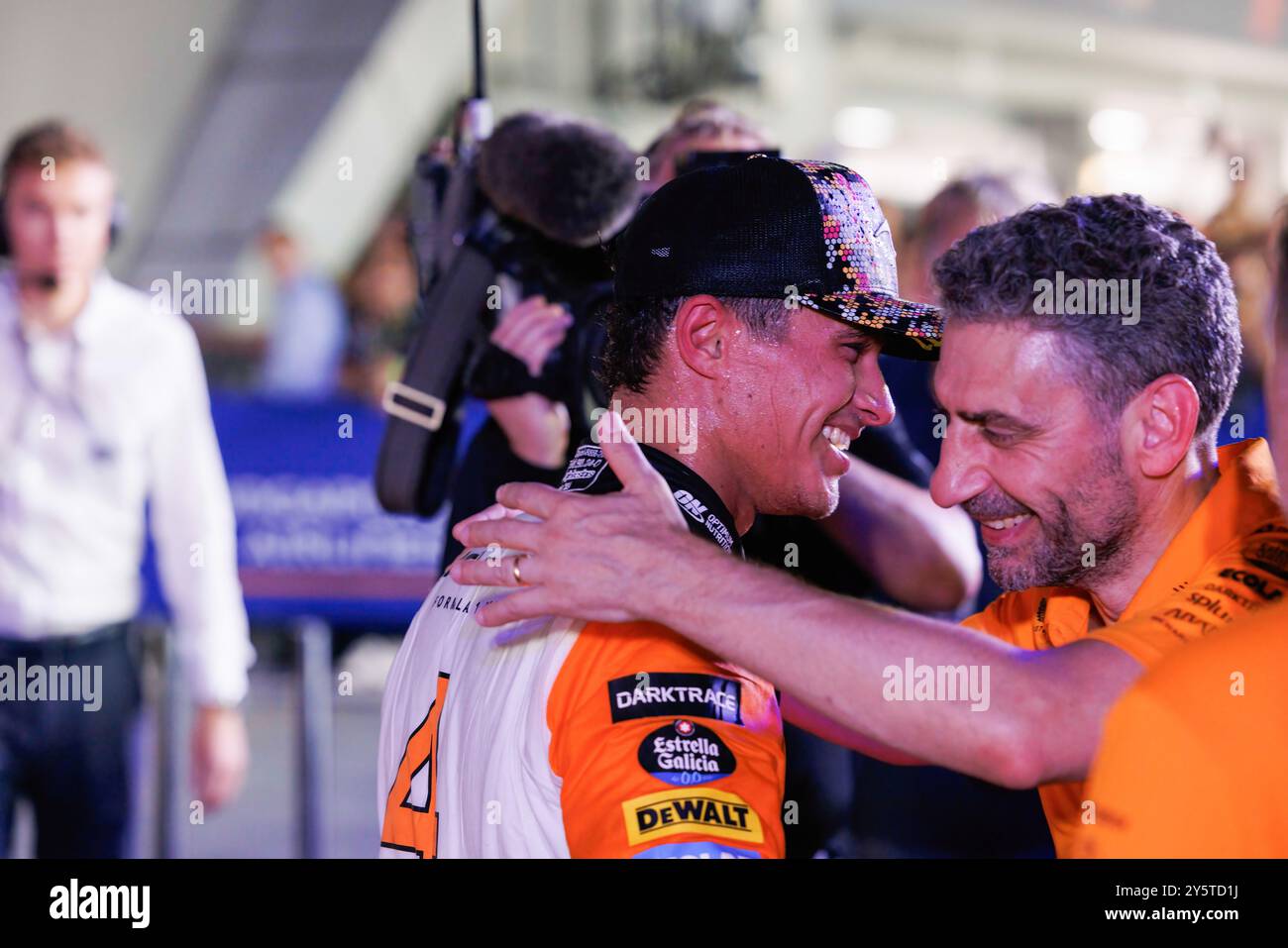 Singapore, Singapore. 22nd Sep, 2024. Lando Norris of Great Britain and McLaren Formula 1 Team embraces McLaren team principal Andrea Stella after winning the F1 Grand Prix Singapore at the Marina Bay Street Circuit. (Credit Image: © George Hitchens/SOPA Images via ZUMA Press Wire) EDITORIAL USAGE ONLY! Not for Commercial USAGE! Stock Photo