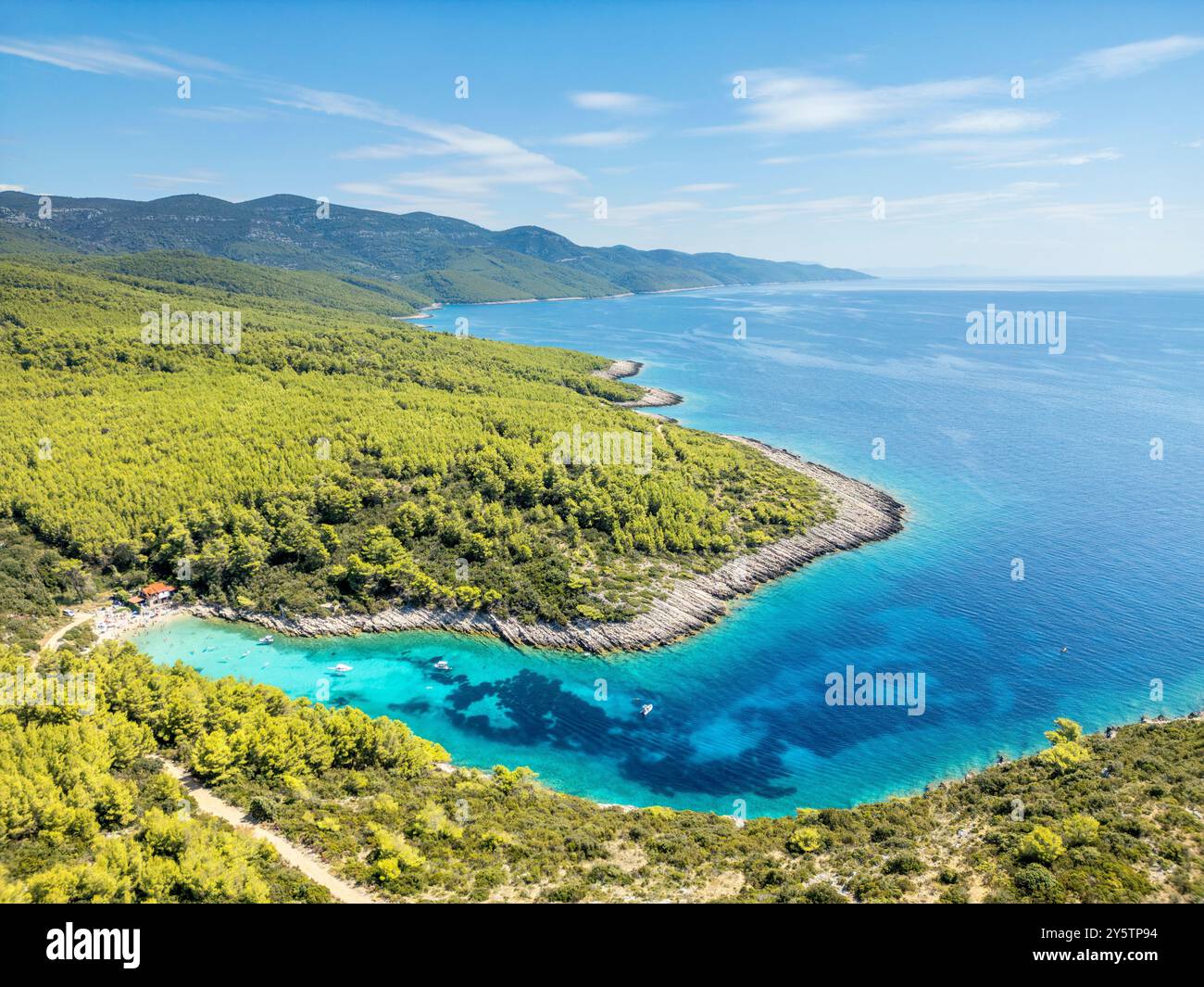 Korcula Island, Croatia - August 5, 2024: An overhead view of Zitna Beach, on a wonderfully spectacular bay on Korcula Island in Croatia. The water is Stock Photo