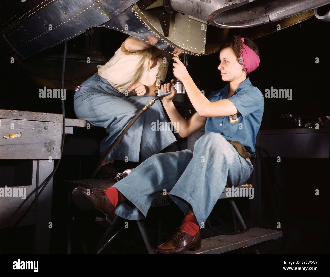 America of the 1940s. Vintage photo of women at work on bomber, Douglas Aircraft Company, Long Beach, California. USA. October 1942 By A. T. Palmer, photographer Stock Photo