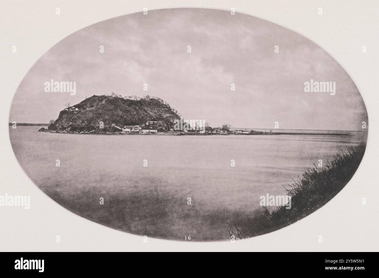 Vintage photo of Silver Island, River Yangtze. Illustrations of Qing China, 1875 '...A few miles below Zhenjiang (Chinkiang) city we pass the mouth of the Grand Canal, perhaps the greatest of the public works in China; at any rate, one which has proved infinitely more useful than the famous Chinese Wall. Here in mid-stream, just below the town, we come upon the rock known among foreigners as Silver Island (see this photo). This is one of the most picturesque objects on the lower river, and, like Puto, is entirely occupied with Buddhist edifices, over which a chief priest or abbot exercises sup Stock Photo