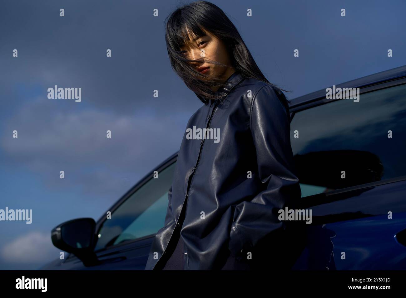 Asian woman in leather jacket hi-res stock photography and images - Alamy