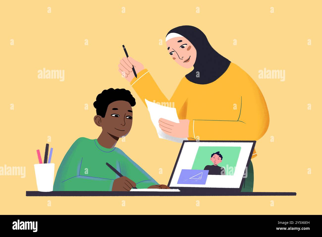 A teacher in a hijab assists a young student with his drawing at a desk ...