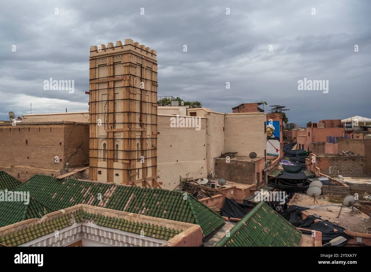 View over the Medina rooftops of Marrakech, Morocco. A tower can be seen, which is wrapped up to support it, after it was damaged in the 23 earthquake Stock Photo