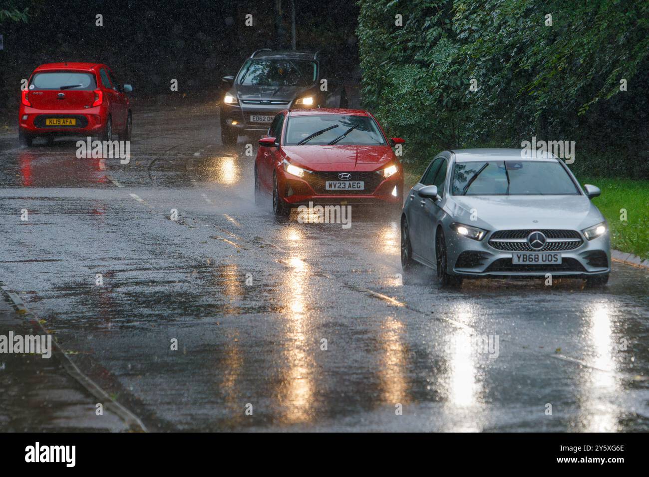 Chippenham, Wiltshire, UK, 23rd Sep, 2024. Drivers are pictured braving very heavy rain in Chippenham as torrential showers make their way across Southern England.Credit: Lynchpics/Alamy Live News Stock Photo