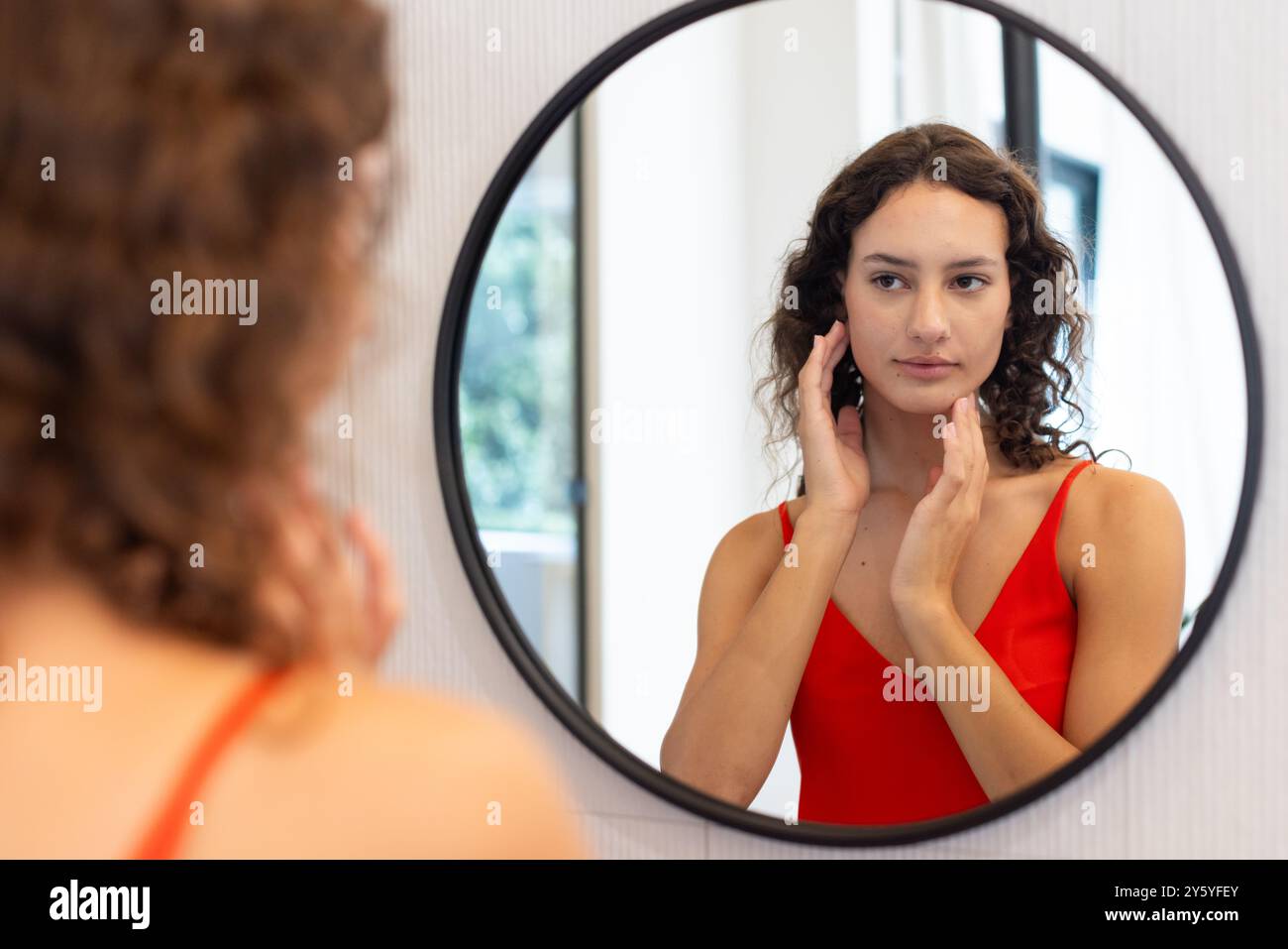 Glamorous woman in red dress hi-res stock photography and images - Alamy