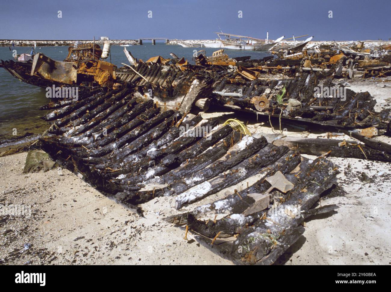 8th March 1991 Destroyed by the fleeing Iraqi Army, the blackened ...