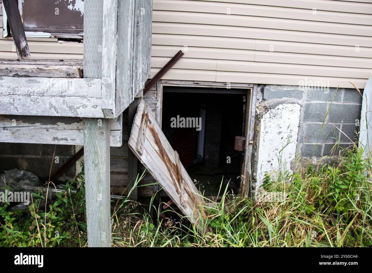 Rear entrance to the abandoned dilapidated Landmark pub on Conception Bay highway in Conception Harbour, Newfoundland & Labrador, Canada Stock Photo