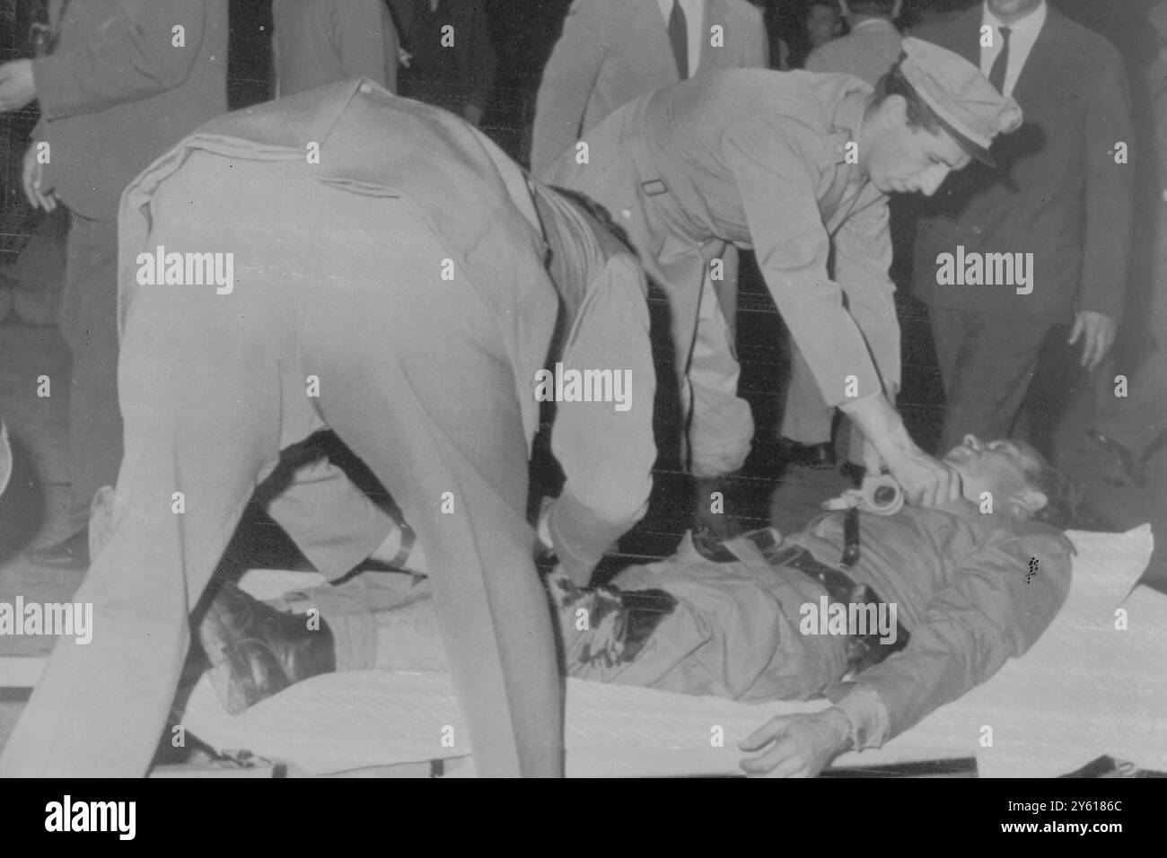 POLICE CASUALTY IN ROME RIOTS 6 JULY 1960 Stock Photo - Alamy