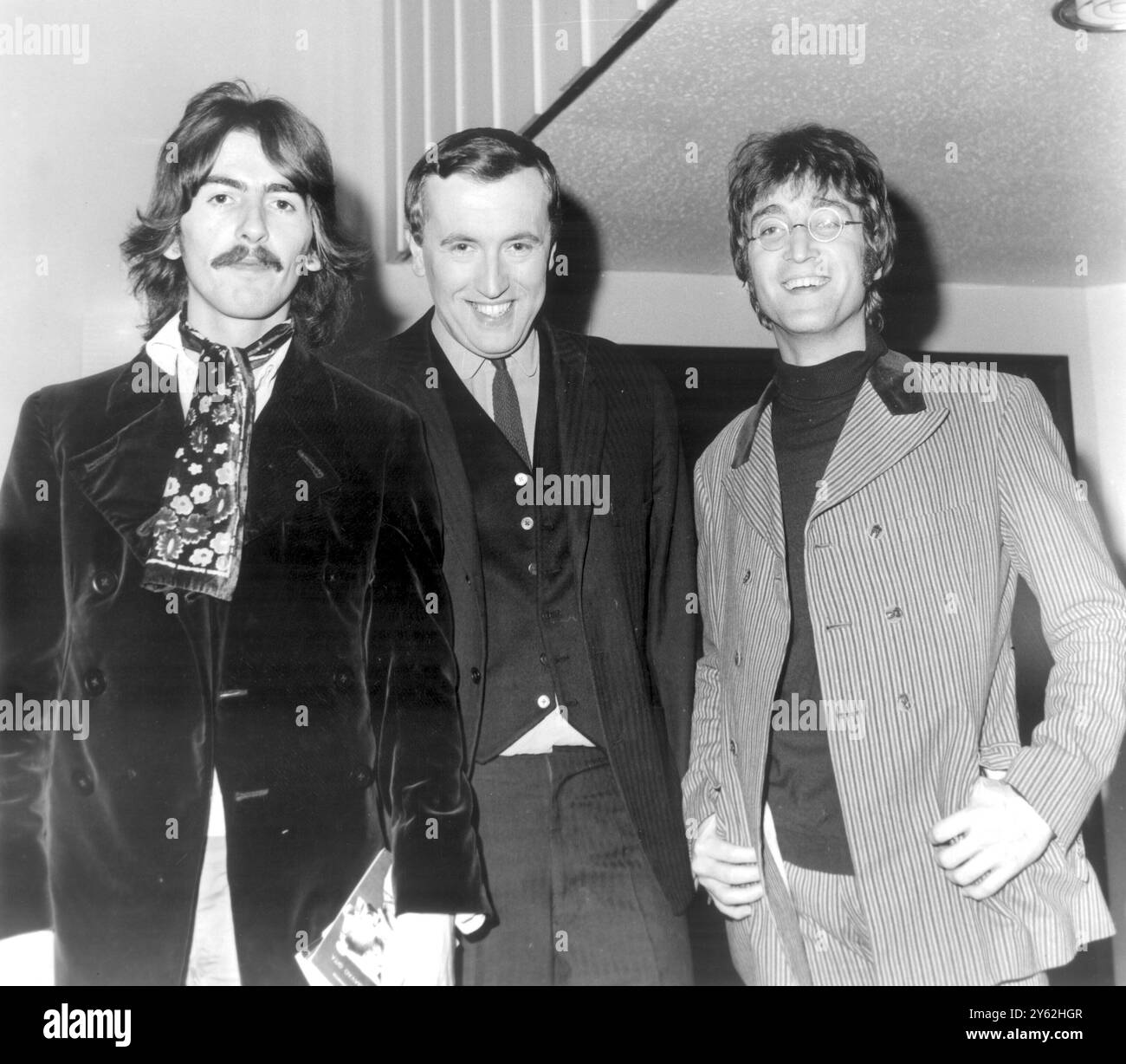 George Harrison and John Lennon with David Frost before they appeared ...