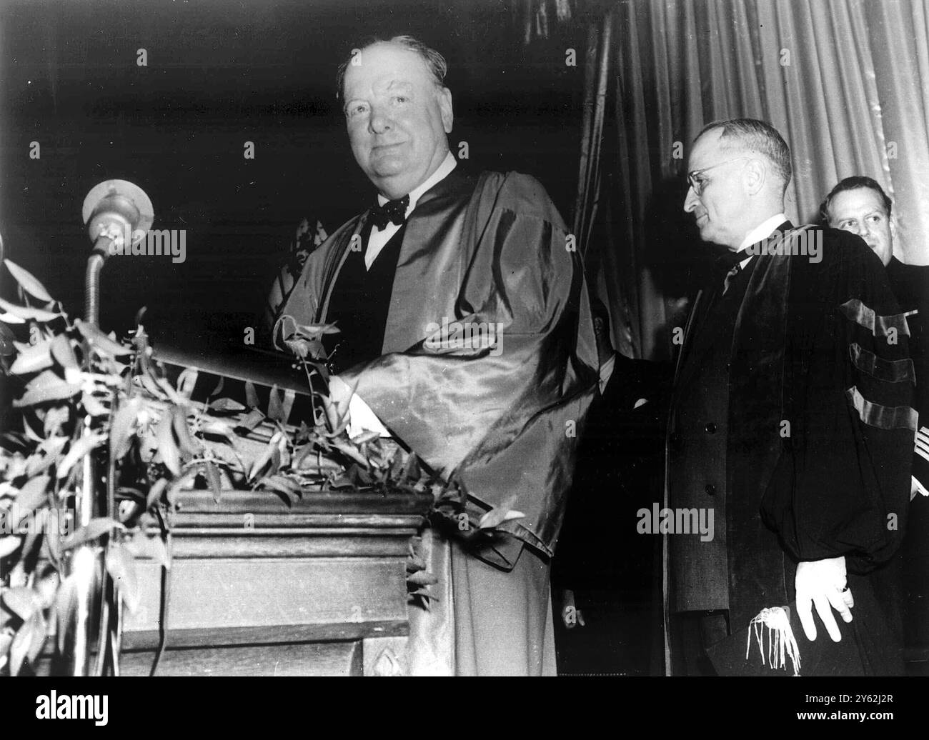 President Harry Truman presents Winston Churchill to his audience at Westminster College , Churchill called for a permanent Anglo-American military alliance which might some day include citizenship - 7th March 1946 in Fulton, Missouri USA Stock Photo