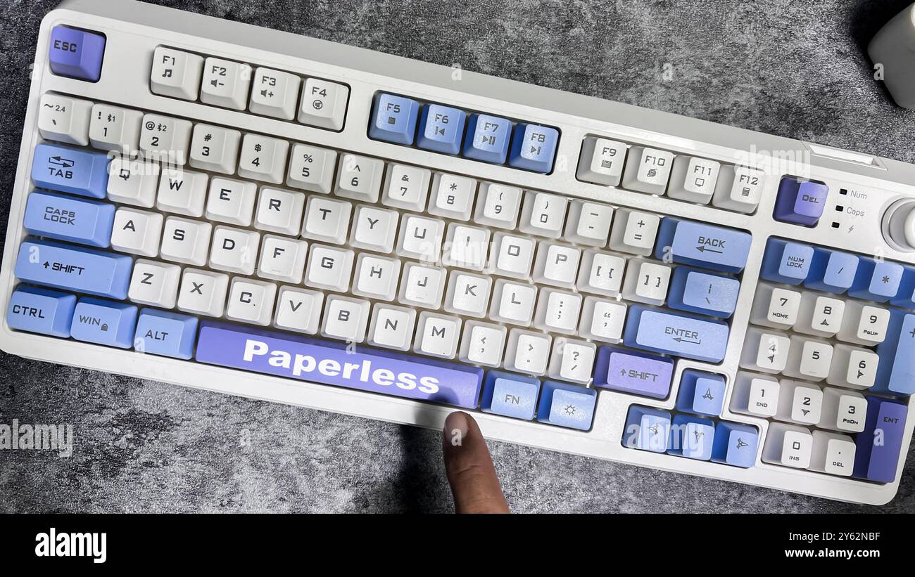 Paperless isolated on laptop keyboard background. Stock Photo