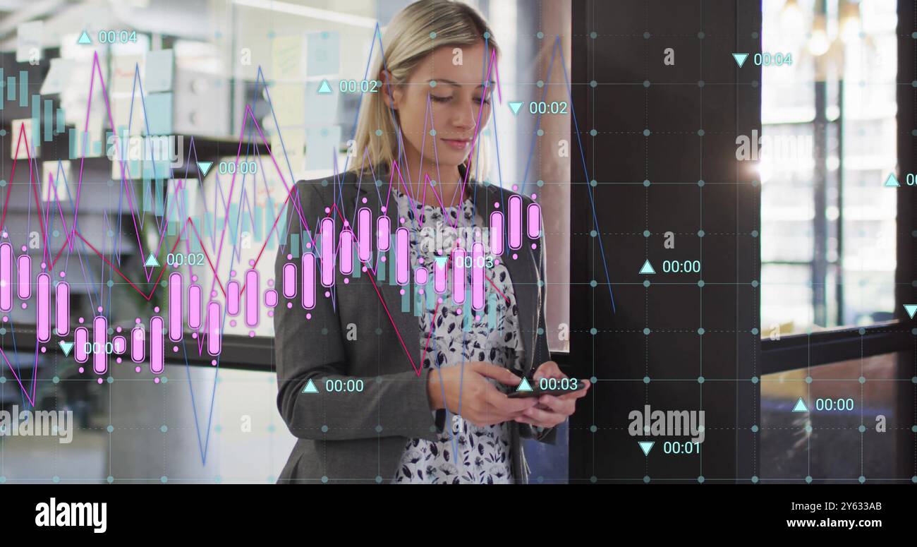 Analyzing financial data charts over businesswoman using smartphone in office Stock Photo