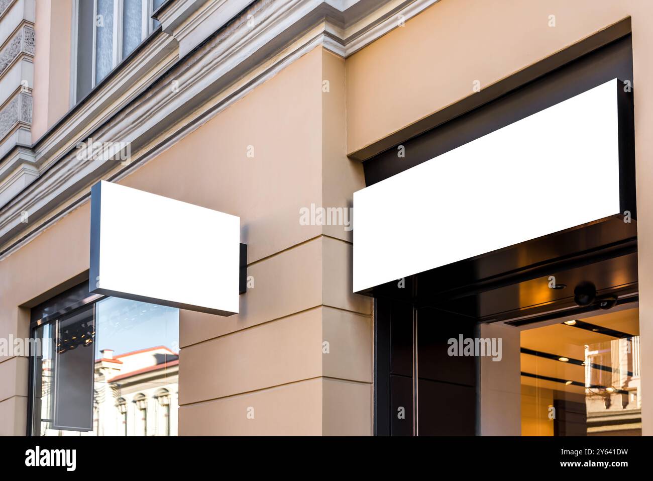 Two Mock Ups Of Restaurant Blank White Rectangular Street Signboards On Yellow Wall Stock Photo