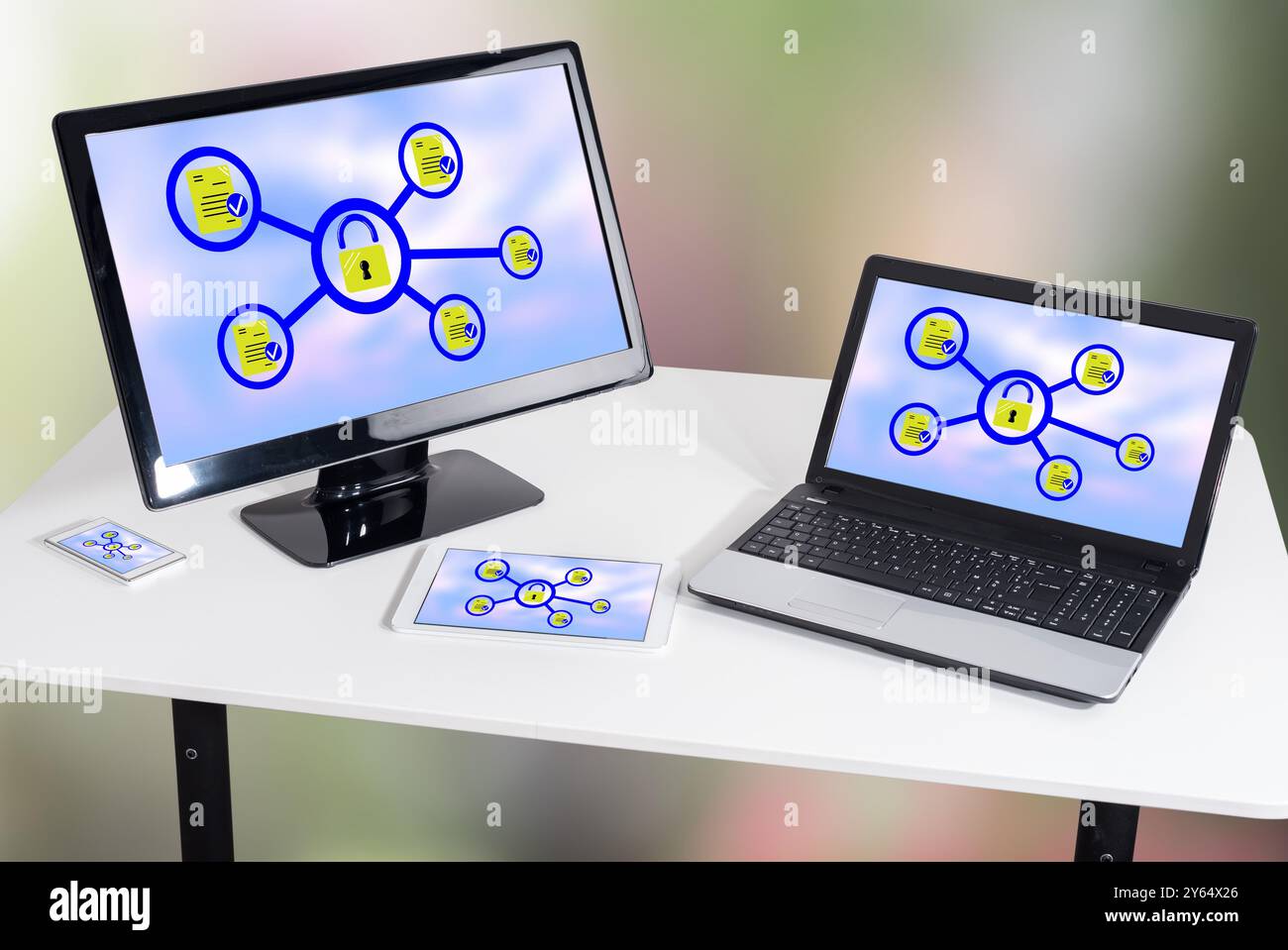 Data protection concept shown on different information technology devices Stock Photo