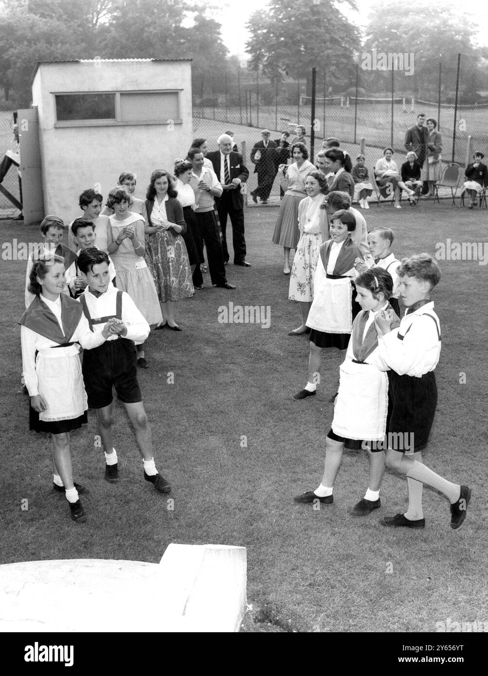 The English Folk Dance and Song Society ( Dartford Group ) held a country dance evening at Central Park , Dartford , Kent , England . It was well attended by enthusiasts including a group of mixed pupils from Temple Hill County Junior School . - - 1 June 1959 Stock Photo