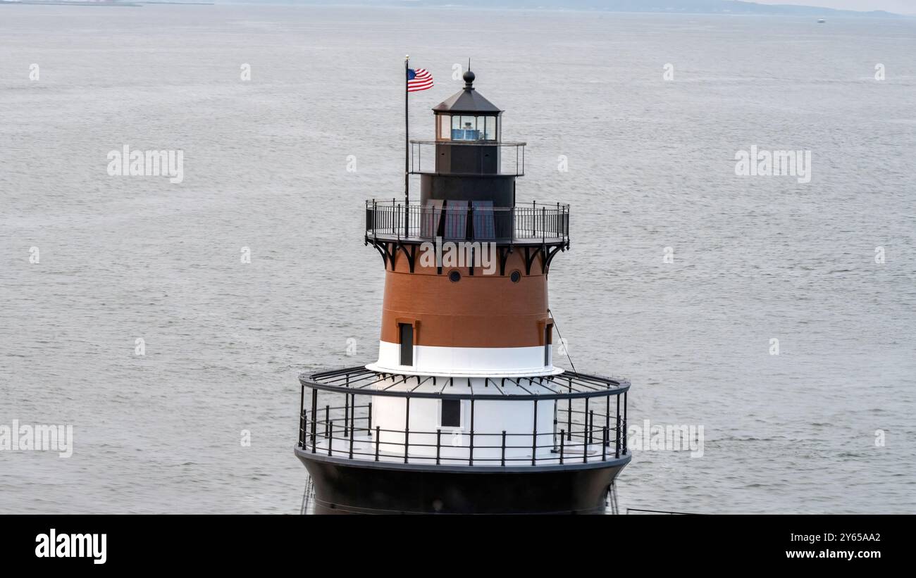 Front Lighthouse Plum Beach Lighthouse in front of the Jamestown Bridge, Rhode Island ...