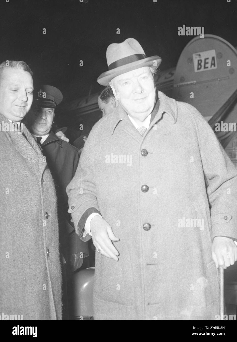 Sir Winston returns Home From Riviera Looking fit , and smiling , elder British statesmen Sir Winston Churchill arrives at London airport from vacationon the French RIviera . The fromer prime Minister has been the guest of lord Beaverbrook in the Latter ' s sunny villa at Cap D ' Ail . During his protracted stay on the riviera , Sir Winston and Lady Churchill inspected a number of villa ' s and estates with a view to buying their own home on the Cote D ' Azur , according to local reports  14th November 1955 Stock Photo
