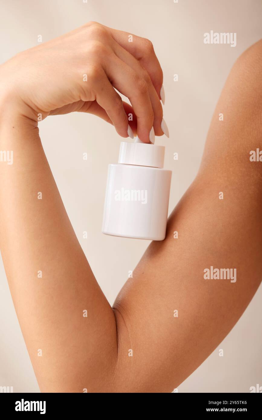 Using Lotion Pump Woman uses hand pump hi-res stock photography and images - Alamy