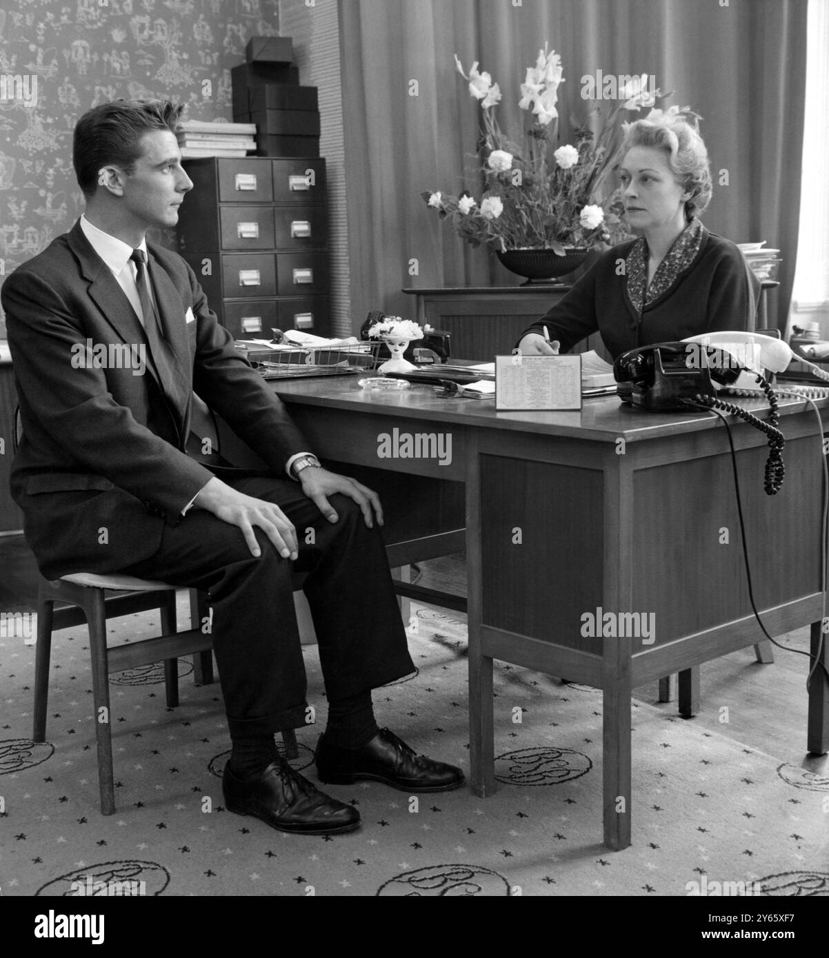 Interview desk Black and White Stock Photos & Images - Alamy
