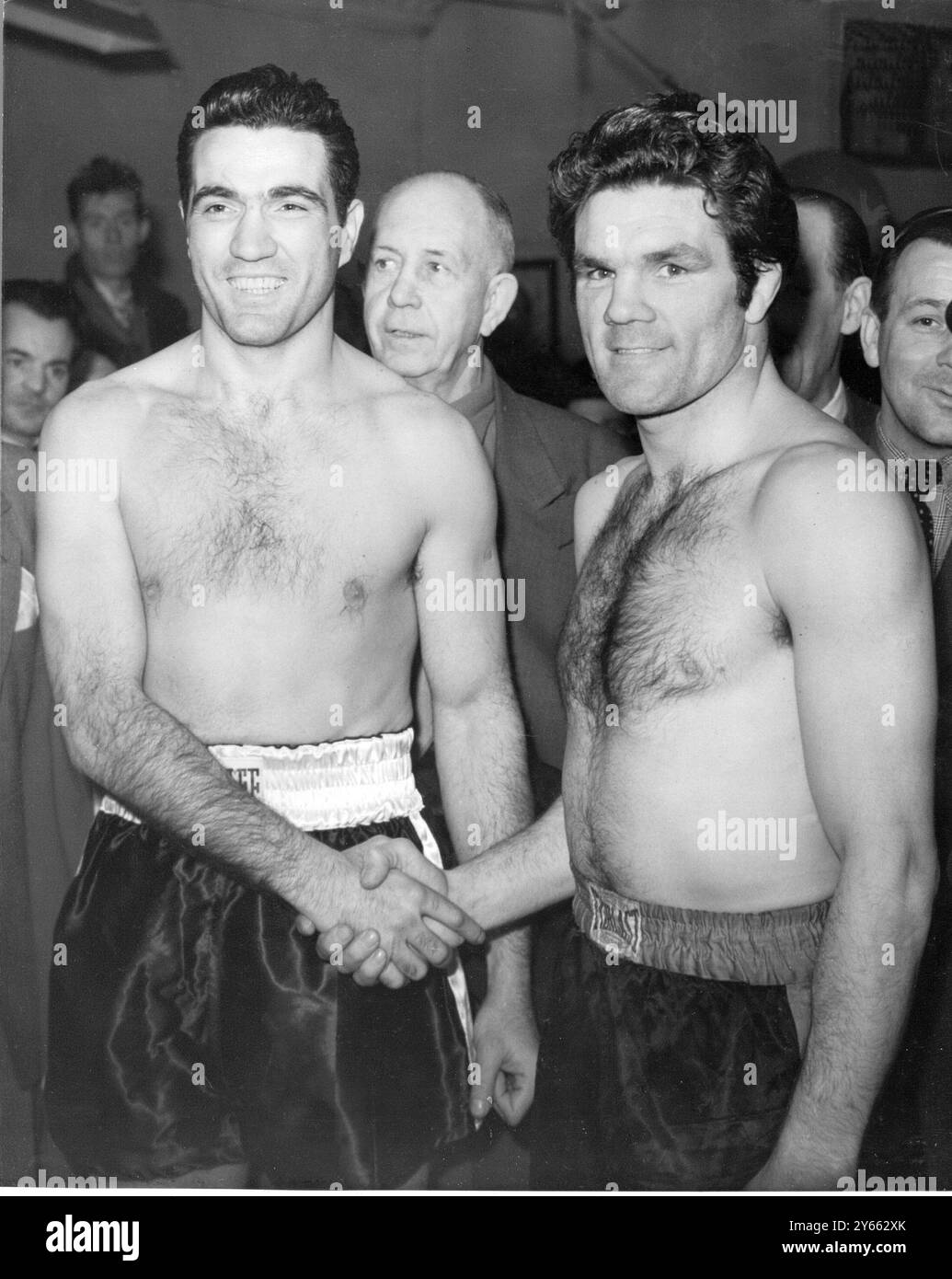 Light heavyweight champion Joey Maxim is weighed in for