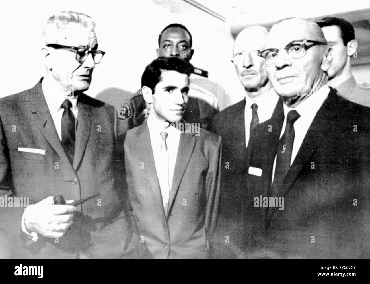 Sirhan B Sirhan 2nd from right, is flanked by his three defence attourneys, Russell Parsons, left,  Emile Zola Berman,rear and  Grant B Cooper, at the start of the trial against the Jordanian immigrant who is charged with the murder of Sen. Robert Kennedy.  Los Angeles - 9th January 1969 Stock Photo