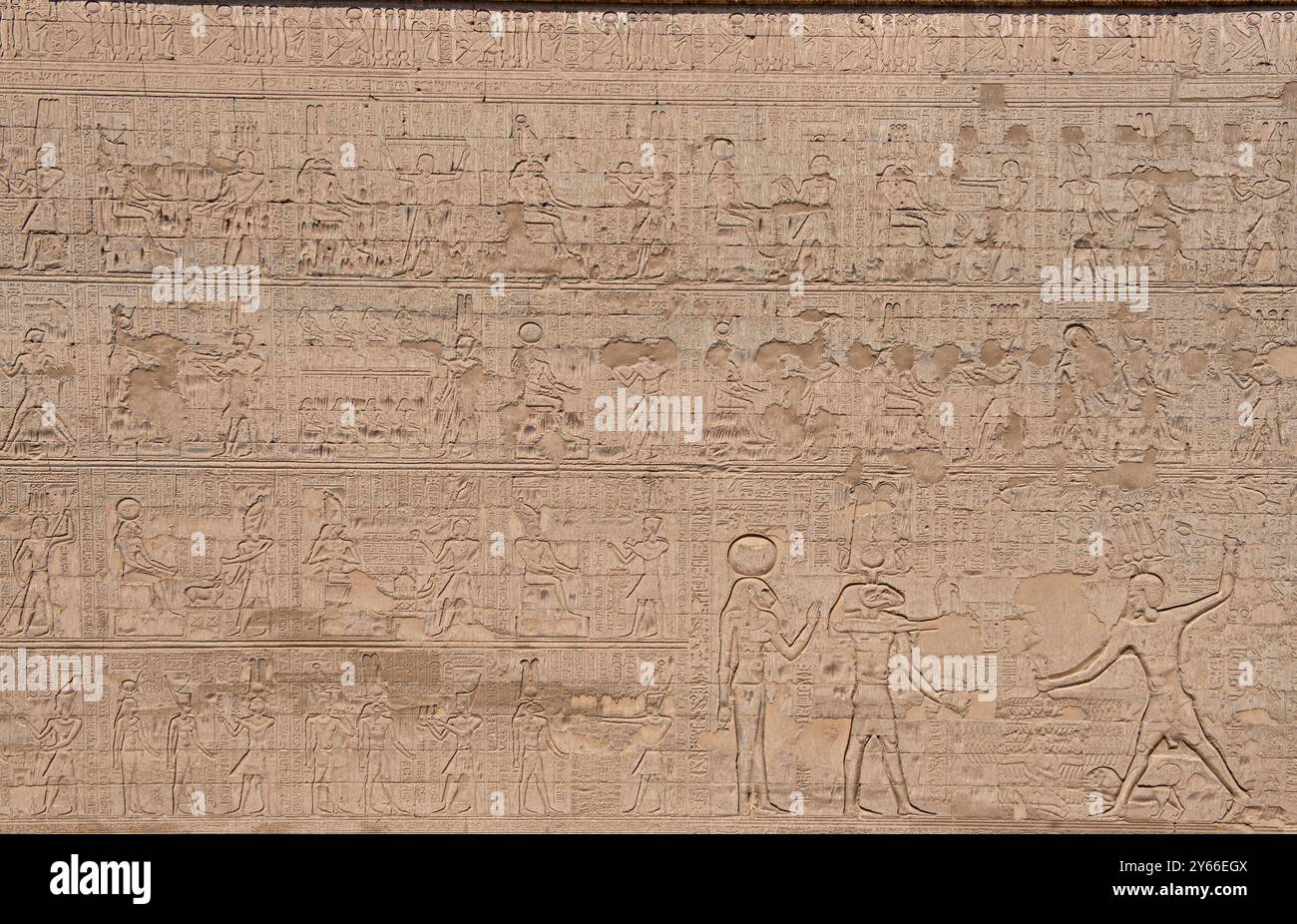 Hieroglypic carvings on wall at the ancient egyptian Temple of Khnum in ...