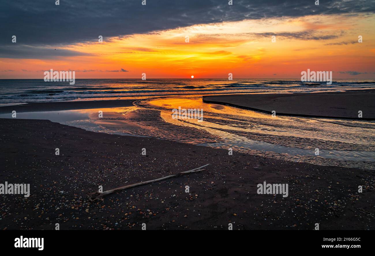 The mouth of a small river flowing into the sea Stock Photo - Alamy