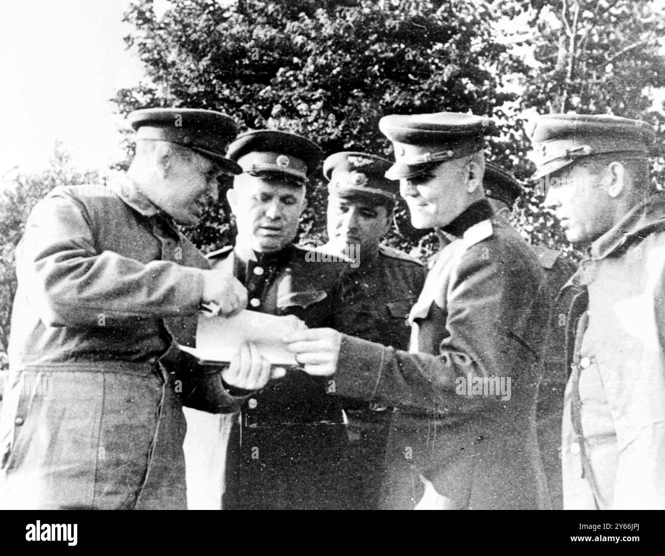 Soviet Premier Nikita Khruschev (second left) and Marshal Konev at a ...