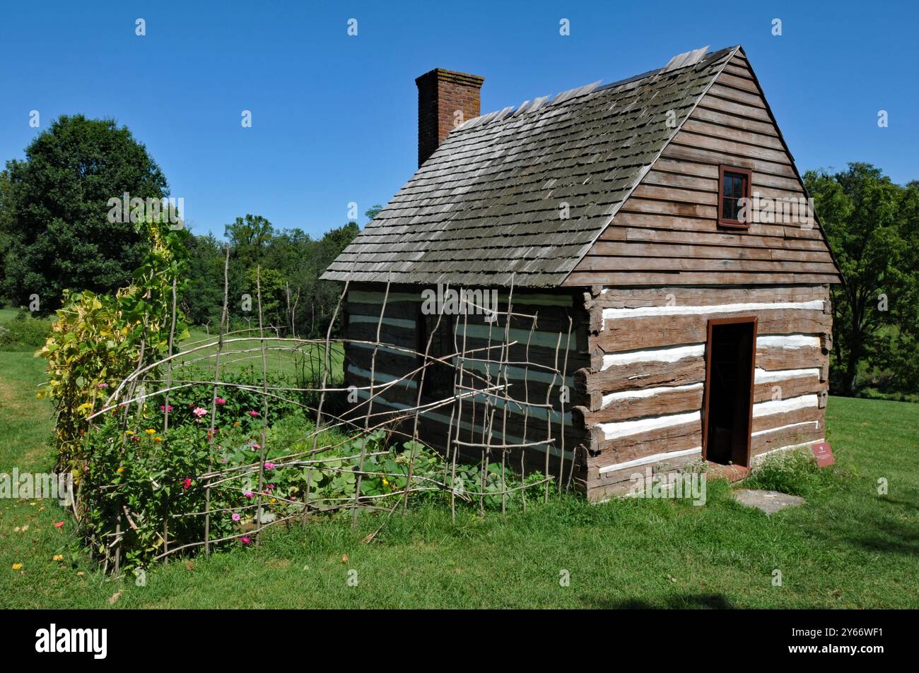 A log building and small garden at historic Locust Grove in Louisville, Kentucky. Stock Photo